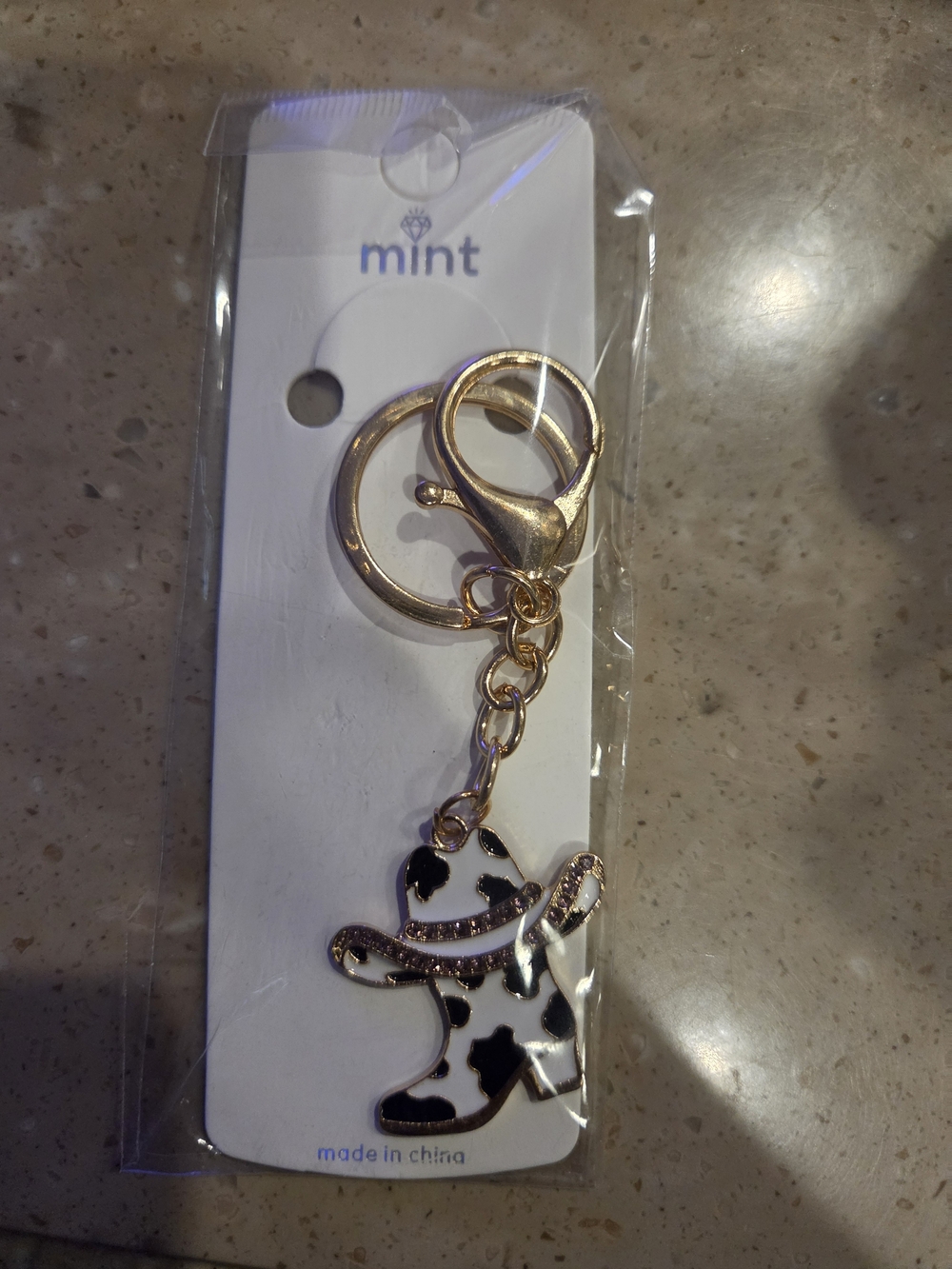 Mint Gold-Tone Keychain with Black & White Cow Charm